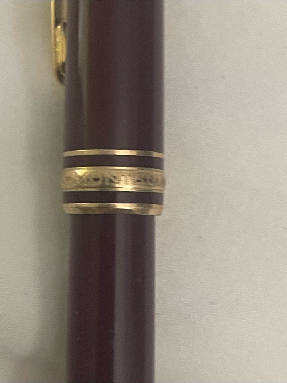 Montblanc Burgundy and Gold Fountain Pen.